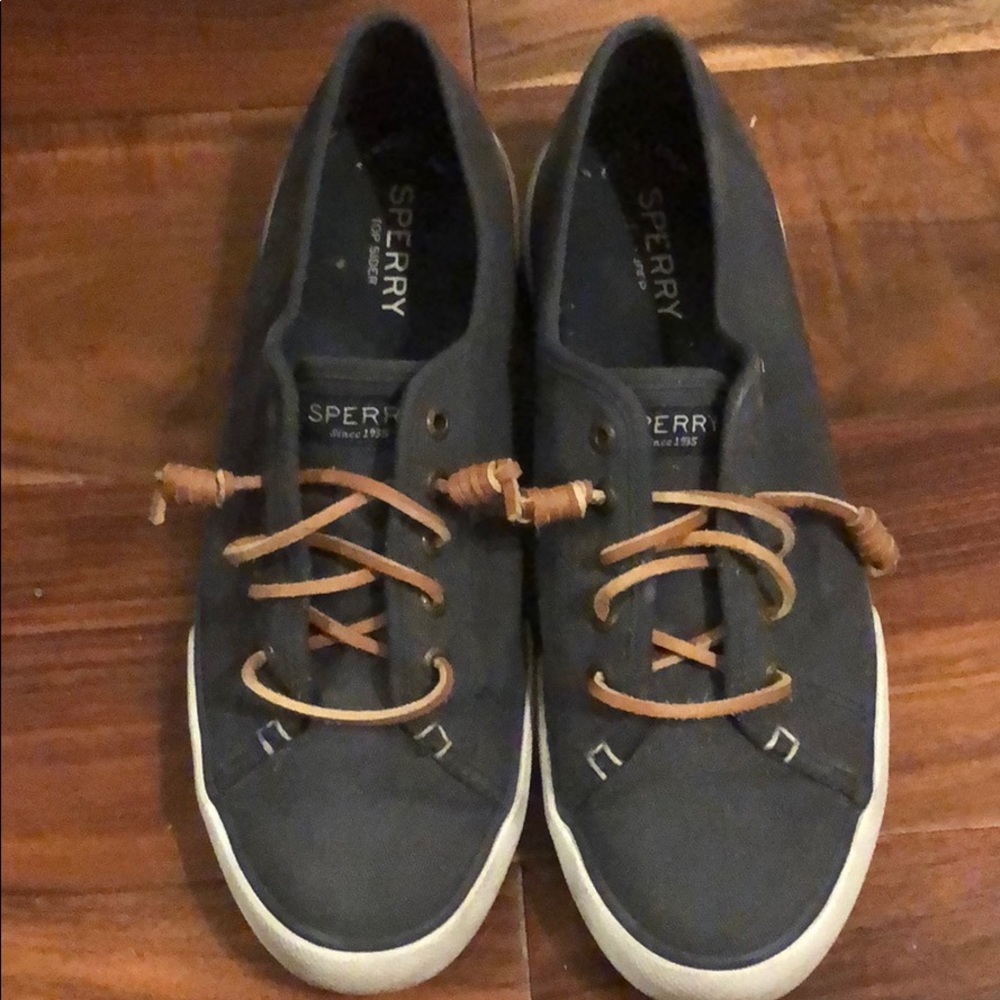 Sperry slip on sneakers.